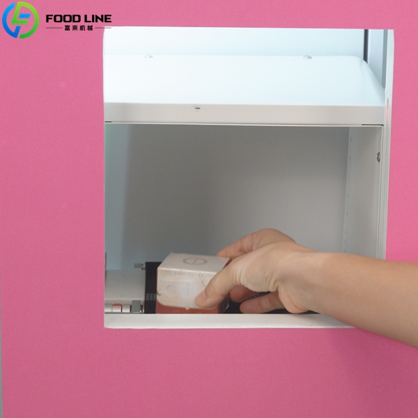 beauty vending machine dispensing slot