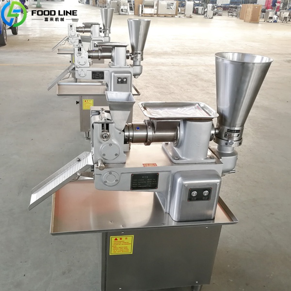 automatic dumpling making device