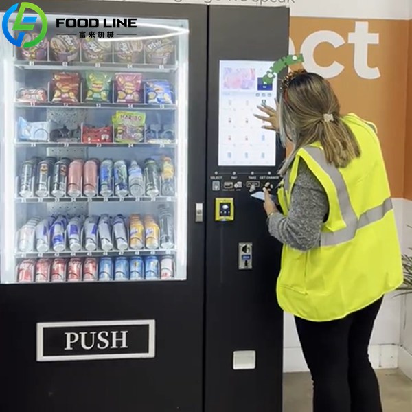 customer using the snack and beverage vending device