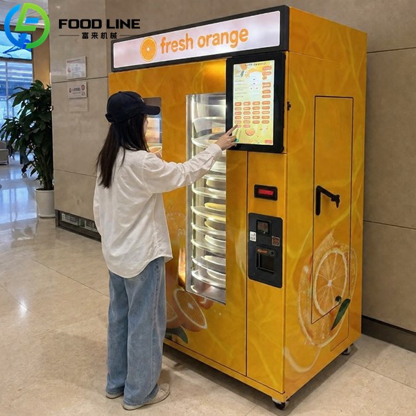 using the orange juice vending machine